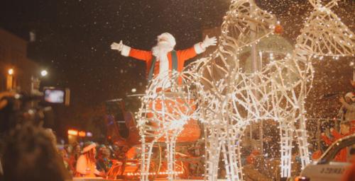 Father Christmas on a lit up sleigh at the Swansea Christmas Parade