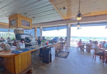 Accessible outdoor waterfront dining at Laishley Crab House in Punta Gorda, Florida.