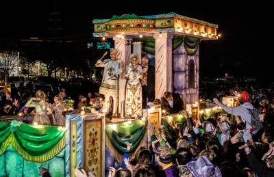 The King and Queen of the Krewe of Eve aboard a royal float.