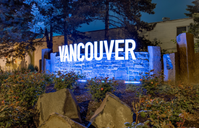 Vancouver Gateway sign lit up purple
