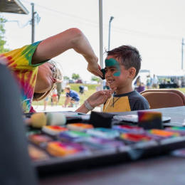 child getting his face painted