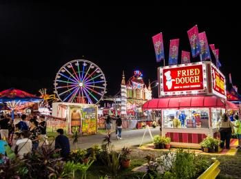Night view of midway rides and eateries at Prince William County Fair 2017