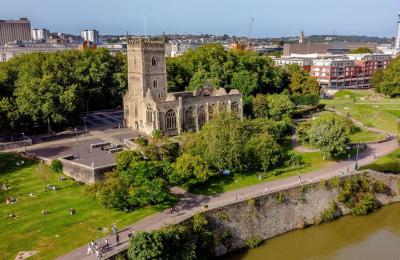 An aerial view of Castle Park and St Peter's Church in central Bristol