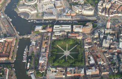 An aerial view of central Bristol landmarks, including the Harbourside and Queen Square