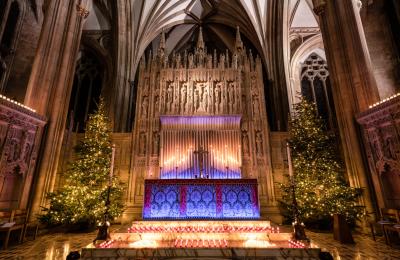 Bristol Cathedral alter with Christmas trees and candles  - Credit Bristol Cathedral