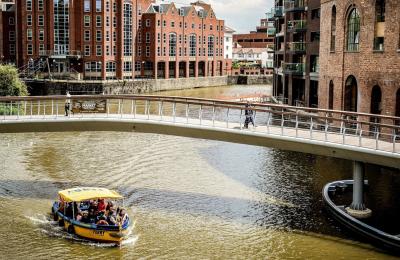 A Bristol Ferry Boat sailing under Castle Bridge in Finzels Reach, towards Bristol's Harbourside