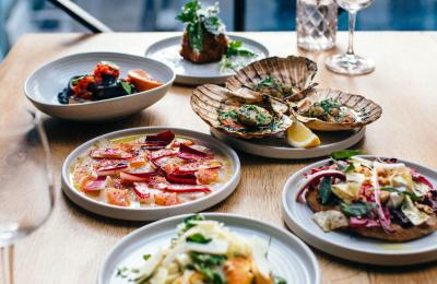 Selection of small plates on a table at Bristol Lido