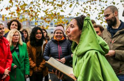 People on a walking tour with costumed guide - credit Show Of Strength Theatre Company