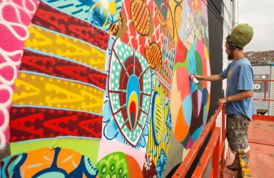 Louis Masai painting at Upfest 2016 in Bedminster, Bristol - Credit Plaster