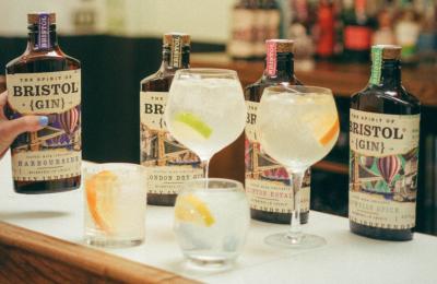 Bottles of gin and G&Ts on bar - credit The Spirit of Bristol