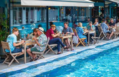 Bristol Lido people dining by pool