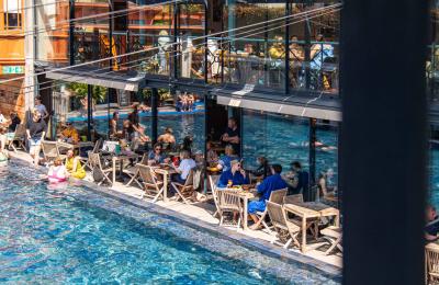 Bristol Lido people dining by pool