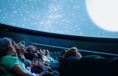 Audience sitting inside the Planetarium at We The Curious in Bristol - credit Alastair Brookes - KoLAB Studios