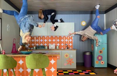 Family playing in kitchen - credit Upside Down House