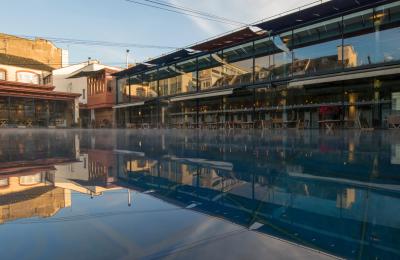 A wide shot of the pool at Clifton Lido by day - credit Andre Pattenden