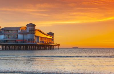 A view of the Grand Pier in Weston-super-Mare near Bristol at sunset - credit Dave Peters
