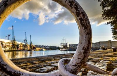 A view of Bristol Harbourside through a mooring chain ring looking towards the M Shed - credit Jim Cossey