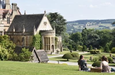 Two women eating a picnic in the grounds of Tyntesfield House, near Bristol - credit Alana Wright