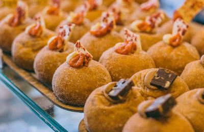 A sourdough donut with a raspberry on top - Credit Supal Desai