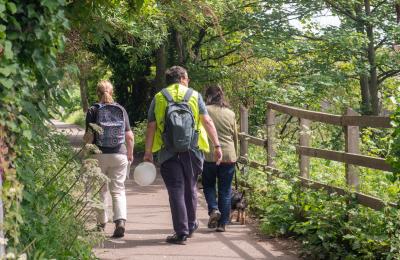 A group of people walking along river path in Brislington, Bristol, as part of Bristol Walkfest - credit Katie Murt