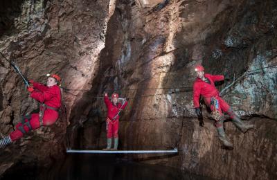 A group participating in the Wild Wookey caving experience at Wookey Hole in Wells, near Bristol - credit Wookey Hole