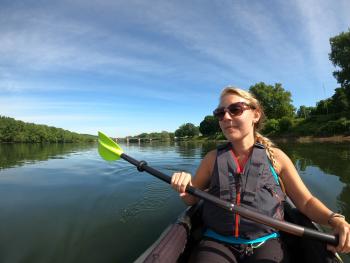 Picture of girl kayaking on the river