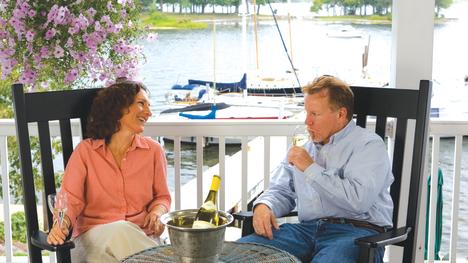 Couple drinking wine on patio