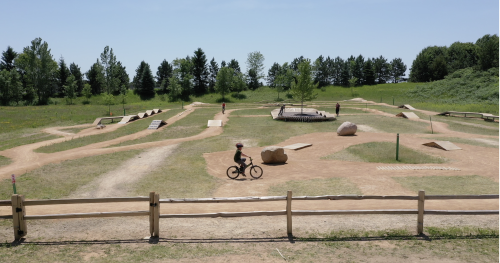 Child biking at bike park