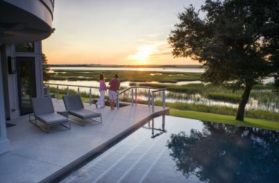 Couple overlooking Intracoastal Waterway at SUnset