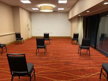 Meeting space with chairs spaced apart at the Oakland Marriott City Center