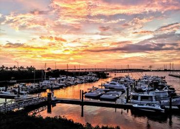 View of the marina and Punta Gorda bridges from Laishley Crab House deck at sunset
