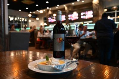 A small dessert is paired with a glass of red wine at Uncork'd in Fort Smith, Arkansas.