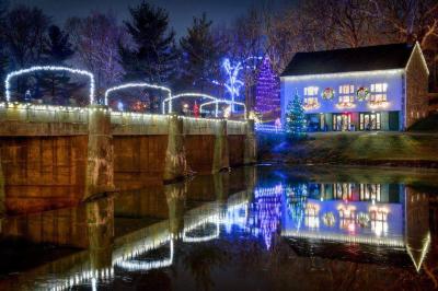 Evening-photo-of-the-bridge-at-Gring_s-Mill-Decorated-with-Holiday-Lights