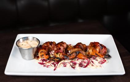 A plate of food from Red Door Woodfired Grill