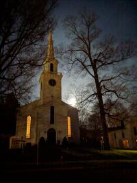 The moon rising over the First Presbyterian Church in Cooperstown