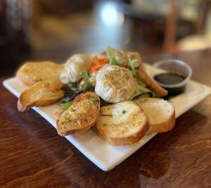 Roasted Garlic with Crostini, at the Old City Hall Restaurant Gilroy