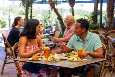 Couple at Farlow's on the Water in Englewood, Florida on a bright fall day.