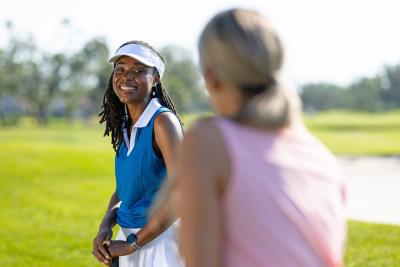 Two female friends golfing at Riverwood Golf Club in Port Charlotte, Florida