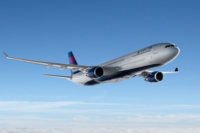Delta airplane in sky