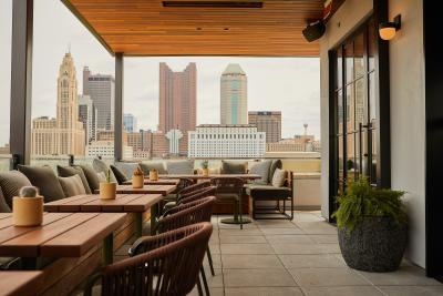 A view of the Columbus skyline from The Brass Eye, a rooftop bar at The Junto