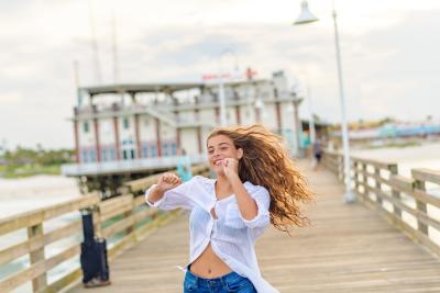 Girl Dancing on Daytona Beach Pier