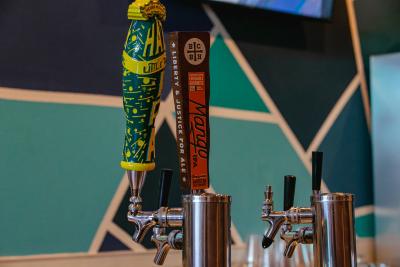 Beer spigots with craft beers on tap