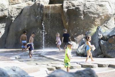 Children play in splash park at Fresno Chaffee Zoo