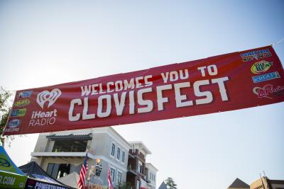 Sign reads "Welcome You to ClovisFest"