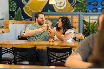 Couple enjoying a beer at Crabtree Brewing Company