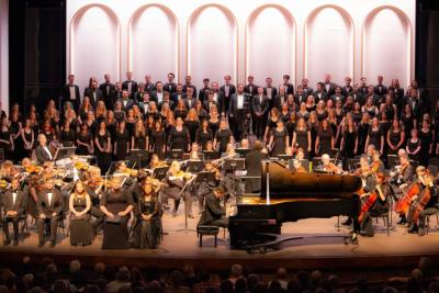 The Greeley Philharmonic Orchestra performing on stage.