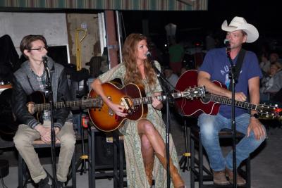 Three Songwriters Singing on Stage during the Blast on the Bay