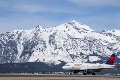 Delta Flight in Front of Tetons - Airport