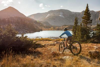 Mountain biking beneath Sugarloaf in fall.