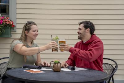 courthouse pub patio cheers with drinks in Manitowoc